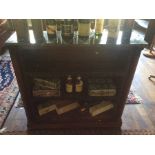 A William IV mahogany and marble bookcase, circa 1835, green marble top above three tier shelving