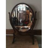 An Edwardian mahogany tilting dressing table mirror