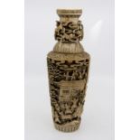 A 19th Century Chinese Canton ivory baluster base, carved in high relief throughout, the neck with a