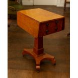 A 19th C figured Hungarian ash pedestal work table with pair of flaps, fitted two short and two