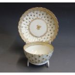 A Caughley  gilt and white tea bowl and saucer, Polka Dot pattern, circa  1780, tea bowl 8.8cm