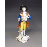 A Samson of Paris 20th Century figure of a young gardener, faux gold anchor mark on back of base,