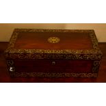A Regency rosewood writing slope, circa 1820, brass inlaid borders of scrolling foliage, flush