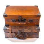 Two early 20th Century leather bound country house cartridge carrying cases, both tan leather with