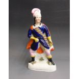 A Staffordshire figure of Henry Earl of Richmond, standing on a gilt lined base,  circa 1860, 22cm