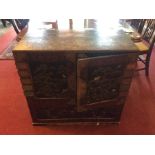 A late 19th Century Oriental cabinet with drawers to the inside, and mother of pearl detail