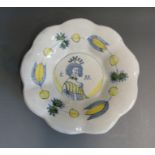 A Dutch Delft scalloped dish with a portrait of King William, circa 1690, 21.5cm diameter, 6cm