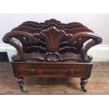 A William IV rosewood canterbury, circa 1835, with leaf divisions joined by turned spindles, above a