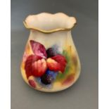 A Royal Worcester vase painted with autumnal leaves and berries, shape G957, signed Kitty Blake,