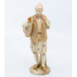 A Royal Worcester blush ivory figure of a water carrier, No.1206, height 20cm