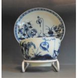 A Worcester blue and white tea bowl & saucer, decorated with’ Bird in a Ring’ pattern, circa  1765,