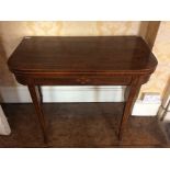 A George III rosewood and satinwood bow fronted card table, circa 1800, blue interior on the