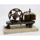 Scientific Interest, a late 19th Century electric shock treatment machine,cast metal mounted on a