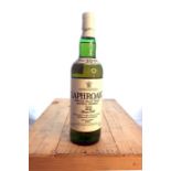 One of bottle of Laphroaig 10 year old Single Islay Malt Scotch Whisky, bottled in the 1990's. Not