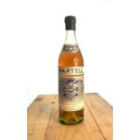 A bottle of Martell Three Star Very Old Pale (VOP) Cognac, bottled 1960's with spring cup.