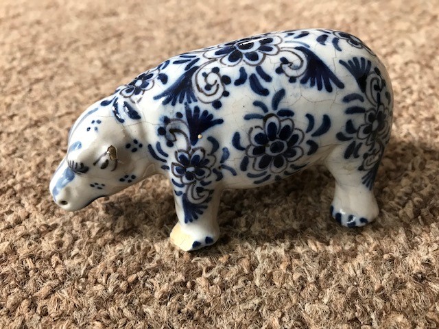 A faience small model of a strolling bear, late 19th/early 20th Century, script mark to base,