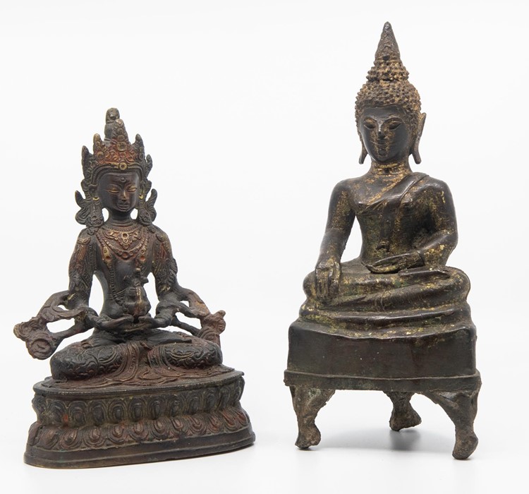 A pair of cold painted bronze Buddhist figures