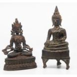 A pair of cold painted bronze Buddhist figures