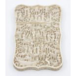 A late 19th Century Chinese ivory calling card case, of cartouche form, carved in high relief with