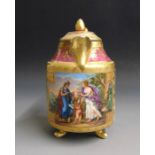 A  Vienna hot water jug and matched cover, with raised gilding over a claret and pink ground. a