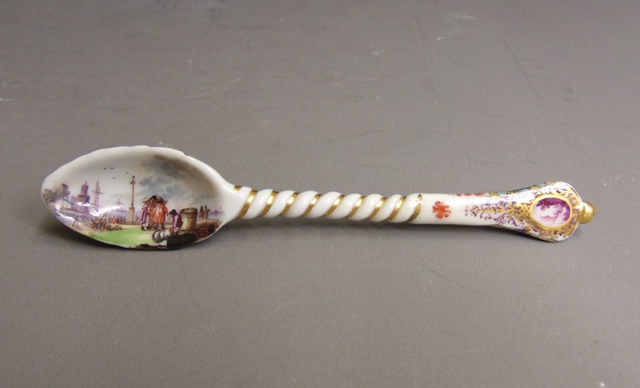 A rare Meissen spoon, the bowl painted with a Kauffahrtei scene of merchants by a quayside, the