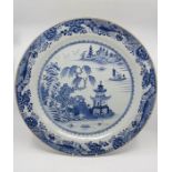A Chinese blue and white export porcelain large dish, Qianlong, circa 1750, painted with extensive