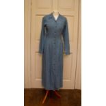 a blue denim maxi dress by Richard Sharps with high patch pockets, buttons down front size 10 late