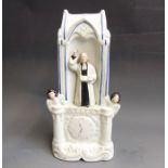 A Staffordshire John Wesley pulpit group, standing on a clock  face base,  circa 1860, 28.5cm high