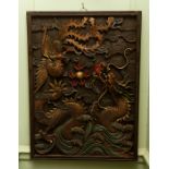 A pair of Chinese decorative carved wooden panels, late Qing Dynasty (19th Century), each carved