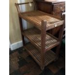 An Early 20th Century Castle's Baltic Wharf (Westminster, London) teak trolley, three panel tiers on