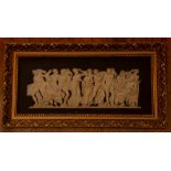 A large early 19th Century Wedgwood black jasper ware frieze of a classical scene, (in a recent gilt