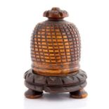 Treen, a 19th Century turned treen beehive shaped string box, on triple feet, height 12cm