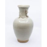 A Chinese Qingbai type vase in Song style, of baluster shape with light blue/green glaze, a single