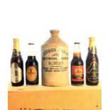 A collection of Breweriana items along with commemorative bottles.