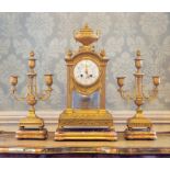A 19th Century French gilt ormolu clock garniture, of Baroque design, urn and pineapple finials,