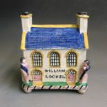A large Yorkshire Mexborough Pottery money box in the form of a Wesleyan chapel, named William