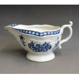 A Worcester blue and white sauce boat, circa 1765, 19cm wide, 10cm high Condition: small chip to