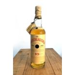 A bottle of Bruichladdich 10 Year Old Single Malt Scotch Whisky. Excellent condition, with