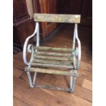 A 19th Century cast iron garden seat, slatted seats with scrolled arms.