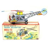 Patrol Helicopter: A boxed, battery operated, tinplate, Patrol Helicopter Bell-12, Made by Modern