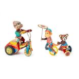 Cycling Chimp: A clockwork, tinplate, Cycling Chimp Pulling a Bear, Made in Japan, length approx.