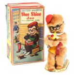 Shoe Shine Joe: A boxed, battery operated, Shoe Shine Joe with Lighted Pipe, Made by Nomura,