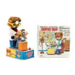 Dentist Bear: A boxed, battery operated, tin and plush, Dentist Bear, with Drilling Hand-Piece and