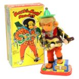 Rock 'n' Roll Monkey: A boxed, battery operated, tinplate, Rock 'n' Roll Monkey with Lighted