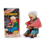 Little Shoemaker: A boxed, mechanical, tinplate, Little Shoemaker, Made by Alps, Japan, complete