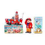 Walking Happy Clown: A boxed, mechanical, tinplate, Walking Happy Clown with Stick, Made by