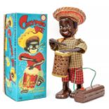 Calypso Joe: A boxed 1950's battery operated, remote control, tinplate, Calypso Joe, Made by Linemar