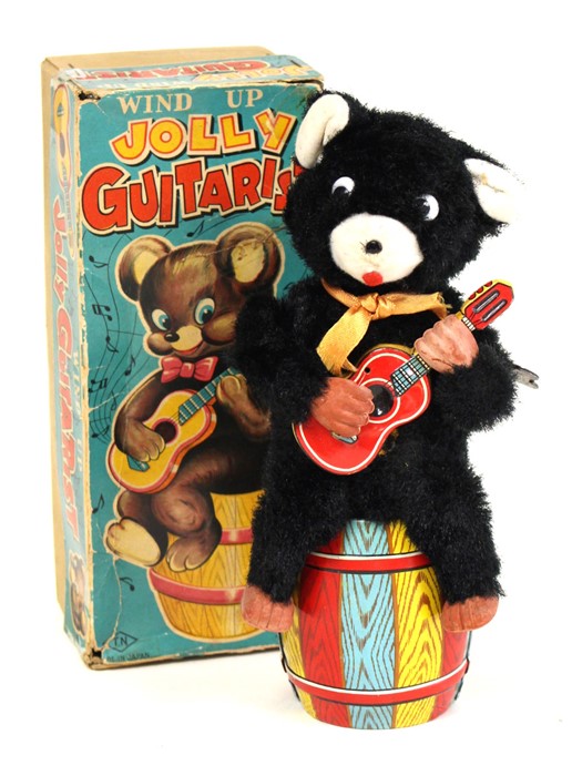 Jolly Guitarist: A boxed, wind-up clockwork, Jolly Guitarist, Made by TN (Nomura), Japan, working