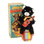 Jolly Guitarist: A boxed, wind-up clockwork, Jolly Guitarist, Made by TN (Nomura), Japan, working