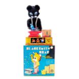 Blacksmith Bear: A boxed, battery operated, tinplate, Blacksmith Bear, Made by A1, Japan, complete